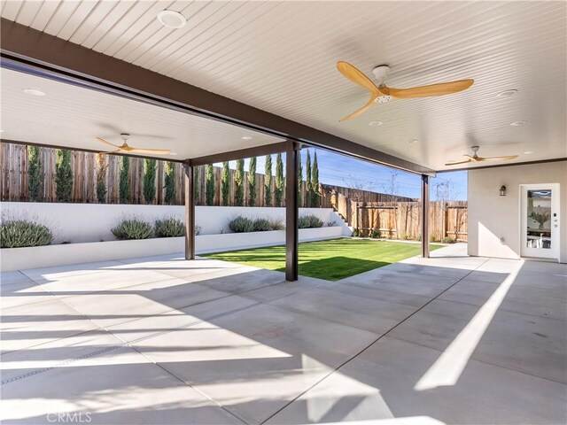 5211 Wingspan Ln, Bakersfield, CA 93306 - view of patio with ceiling fan and a fenced backyard