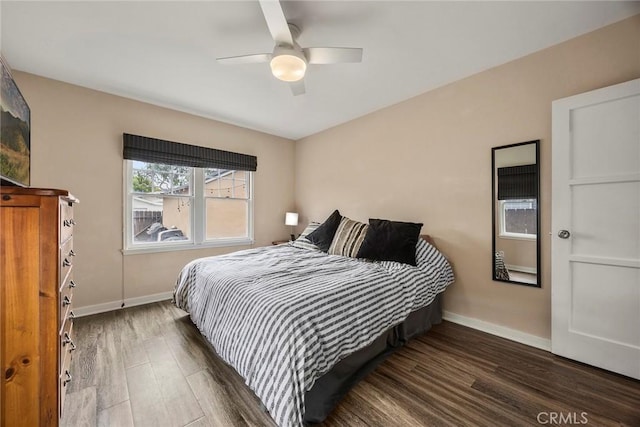 1229 Central Ave, Fullerton, CA 92831 - bedroom featuring baseboards, wood finished floors, and a ceiling fan