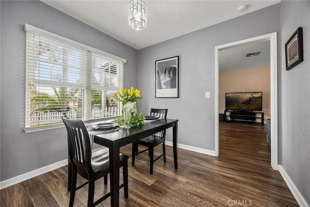 1229 Central Ave, Fullerton, CA 92831 - dining space featuring dark wood-style flooring, baseboards, and a chandelier