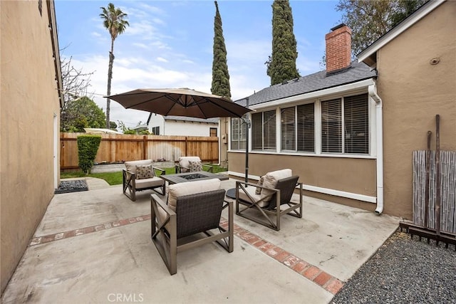 1229 Central Ave, Fullerton, CA 92831 - view of patio / terrace featuring an outdoor living space with a fire pit and a fenced backyard