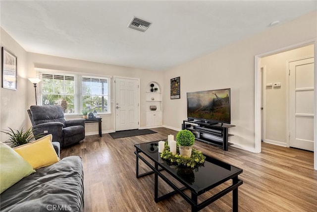1229 Central Ave, Fullerton, CA 92831 - living room featuring wood finished floors and baseboards