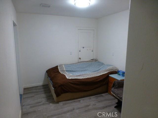 3465 Condor Rd Unit 29, Palms, CA 92277 - bedroom featuring wood finished floors