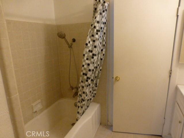 3465 Condor Rd Unit 29, Palms, CA 92277 - bathroom with tile patterned floors and shower / bath combination with curtain