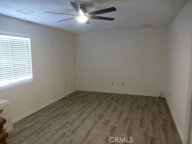 3465 Condor Rd Unit 29, Palms, CA 92277 - spare room with light wood-type flooring, baseboards, and ceiling fan