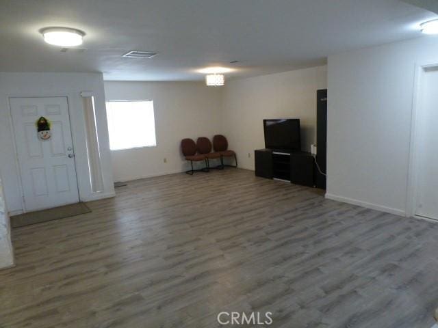 3465 Condor Rd Unit 29, Palms, CA 92277 - interior space with wood finished floors, visible vents, and baseboards