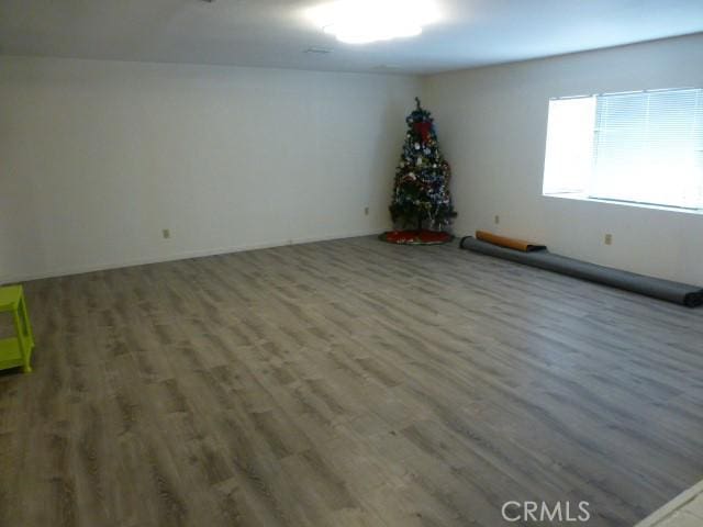 3465 Condor Rd Unit 29, Palms, CA 92277 - spare room with wood finished floors