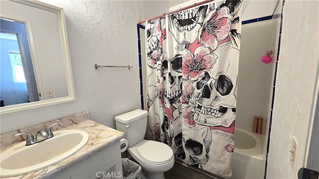 bathroom with a textured wall, vanity, shower / bathtub combination with curtain, and toilet