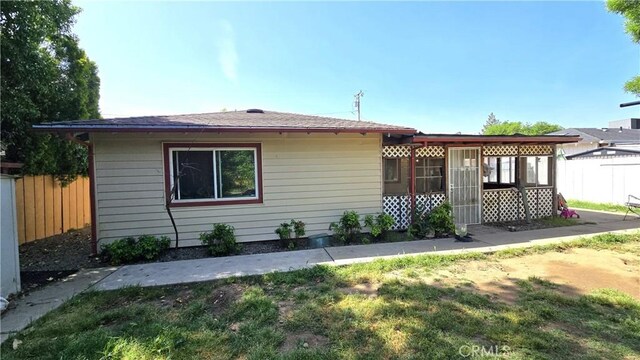 view of front of house with fence