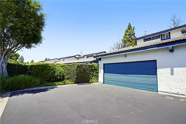 garage with driveway