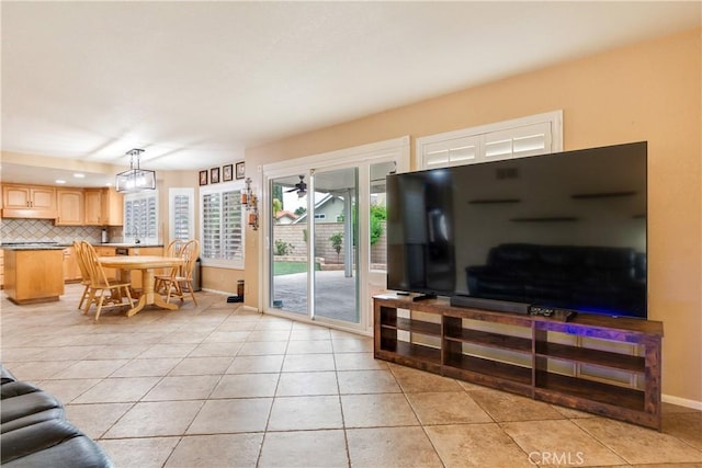 living area featuring light tile patterned floors