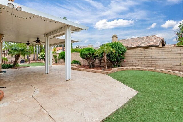 view of patio / terrace featuring a ceiling fan and a fenced backyard