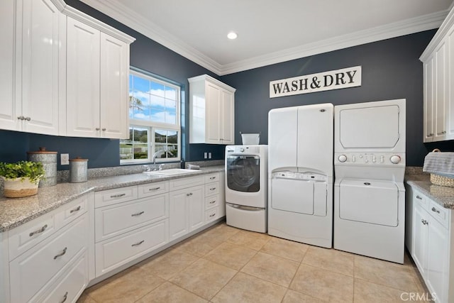 25032 Trilogy Trail Ln, Murrieta, CA 92562 - clothes washing area featuring cabinet space, a sink, light tile patterned floors, ornamental molding, and recessed lighting