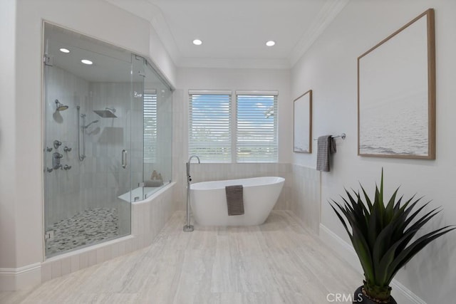 25032 Trilogy Trail Ln, Murrieta, CA 92562 - bathroom with recessed lighting, ornamental molding, a freestanding tub, and a stall shower