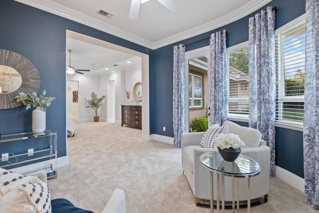 25032 Trilogy Trail Ln, Murrieta, CA 92562 - sitting room featuring visible vents, a ceiling fan, carpet, and crown molding