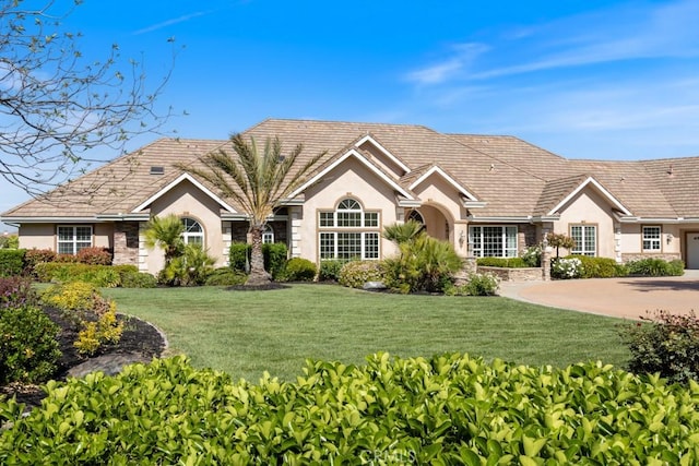 25032 Trilogy Trail Ln, Murrieta, CA 92562 - single story home with stucco siding, stone siding, and a front yard