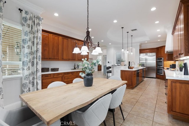 25032 Trilogy Trail Ln, Murrieta, CA 92562 - kitchen featuring light countertops, brown cabinetry, stainless steel appliances, recessed lighting, and a center island with sink