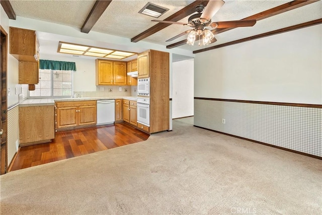 5655 Via Mensabe, Riverside, CA 92506 - kitchen with white appliances, dark colored carpet, ceiling fan, beam ceiling, and a textured ceiling