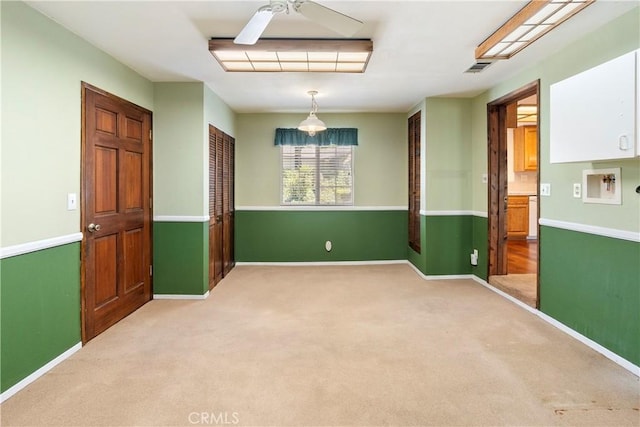 5655 Via Mensabe, Riverside, CA 92506 - spare room featuring ceiling fan, light colored carpet, and baseboards