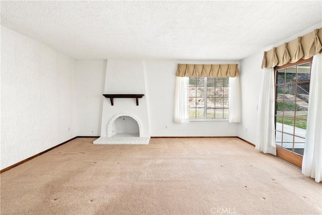 5655 Via Mensabe, Riverside, CA 92506 - unfurnished living room featuring a textured ceiling, carpet flooring, and baseboards
