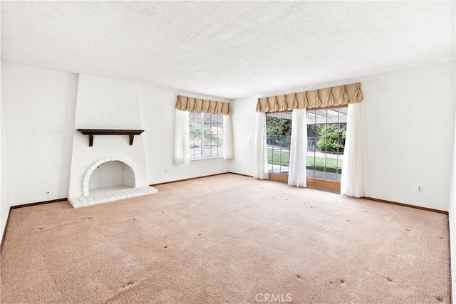 5655 Via Mensabe, Riverside, CA 92506 - unfurnished living room featuring a textured ceiling, carpet, and baseboards