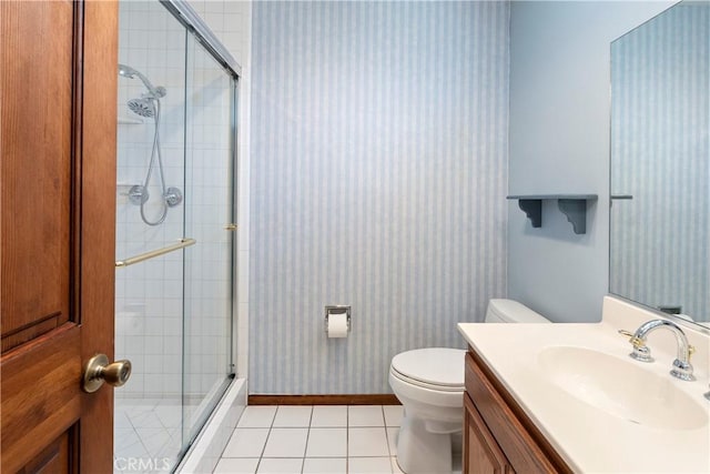 5655 Via Mensabe, Riverside, CA 92506 - bathroom with tile patterned flooring, a shower stall, vanity, toilet, and wallpapered walls