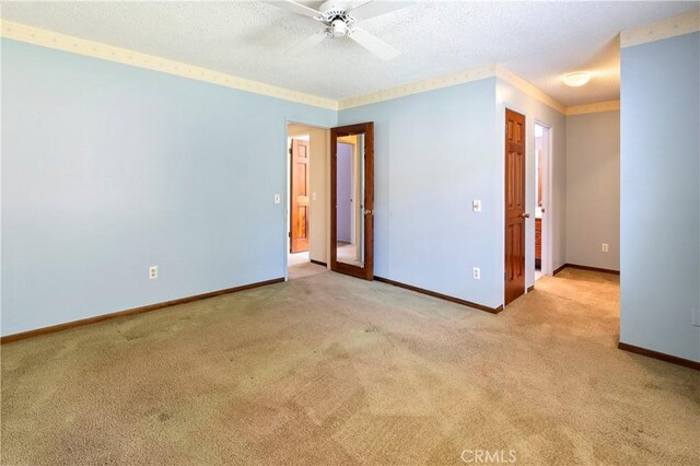 5655 Via Mensabe, Riverside, CA 92506 - carpeted empty room with a ceiling fan, baseboards, crown molding, and a textured ceiling