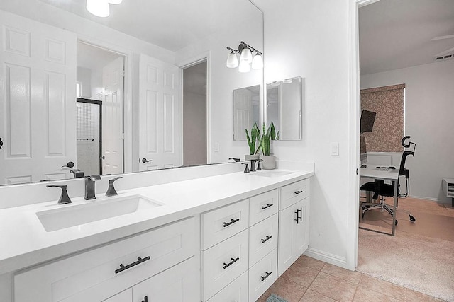 1693 Thompson Ave, Chula Vista, CA 91913 - bathroom featuring double vanity and tile patterned flooring