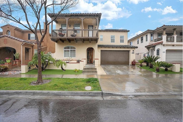 1693 Thompson Ave, Chula Vista, CA 91913 - mediterranean / spanish house featuring a balcony, stucco siding, a garage, a tile roof, and driveway