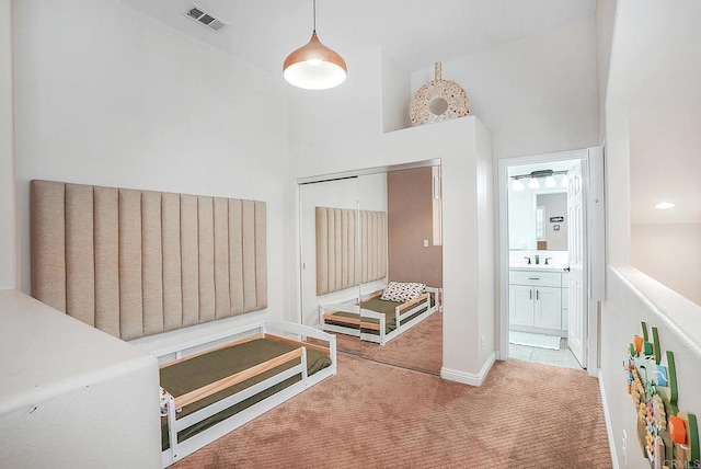 1693 Thompson Ave, Chula Vista, CA 91913 - corridor featuring carpet flooring and a high ceiling