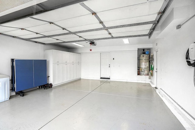 1693 Thompson Ave, Chula Vista, CA 91913 - garage featuring a garage door opener and water heater
