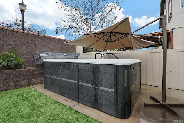 1693 Thompson Ave, Chula Vista, CA 91913 - exterior view of a fenced backyard and a hot tub