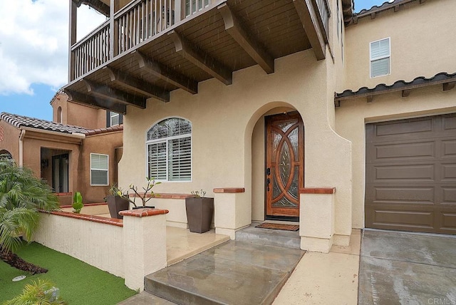 1693 Thompson Ave, Chula Vista, CA 91913 - entrance to property featuring stucco siding, a tile roof, and an attached garage
