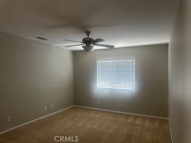 31329 Seminole St, Temecula, CA 92591 - spare room featuring ceiling fan and carpet flooring