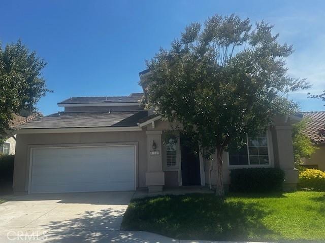 31329 Seminole St, Temecula, CA 92591 - view of front facade with a garage, stucco siding, concrete driveway, and a front lawn
