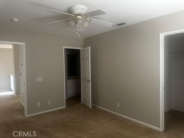 31329 Seminole St, Temecula, CA 92591 - unfurnished bedroom featuring carpet, a closet, a spacious closet, and a ceiling fan