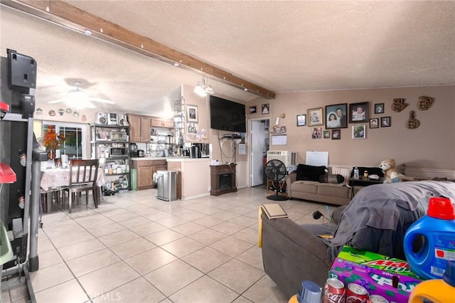 323 Whipple Mountain Rd, San Bernardino, CA 92410 - living room featuring vaulted ceiling with beams, a ceiling fan, light tile patterned flooring, and a textured ceiling