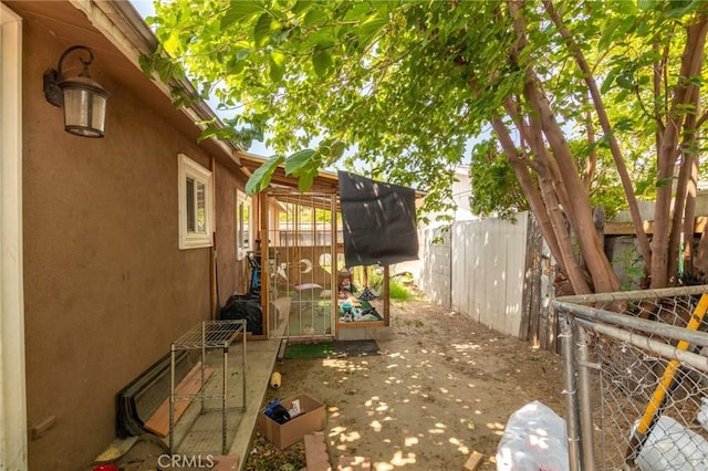 323 Whipple Mountain Rd, San Bernardino, CA 92410 - exterior space with a fenced backyard