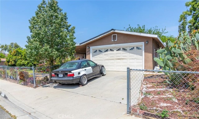323 Whipple Mountain Rd, San Bernardino, CA 92410 - garage with fence and concrete driveway