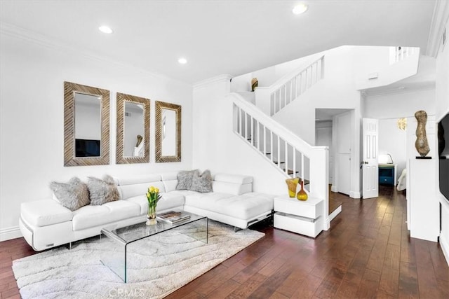 living area with crown molding, stairway, hardwood / wood-style floors, baseboards, and recessed lighting