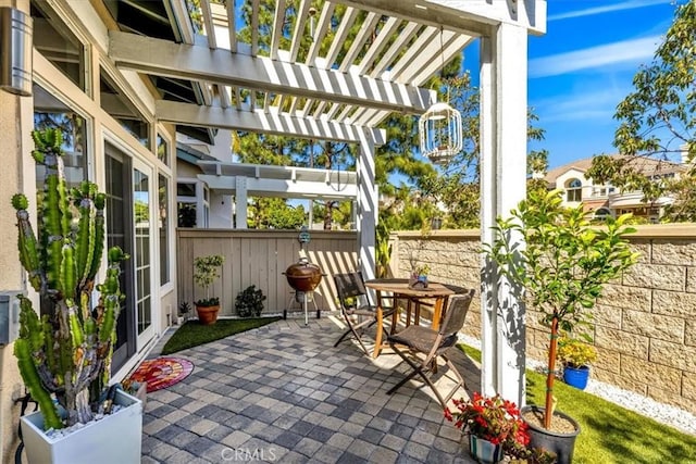 view of patio with a fenced backyard and a pergola