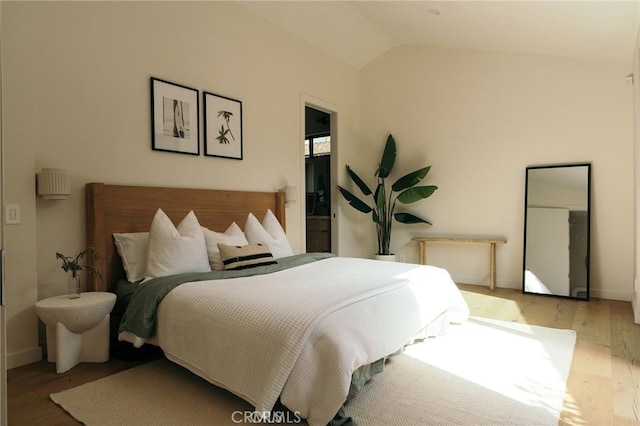 6144 W 76th St, Los Angeles, CA 90045 - bedroom with lofted ceiling, hardwood / wood-style flooring, and baseboards