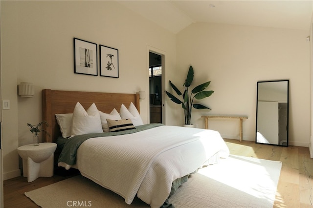6144 W 76th St, Los Angeles, CA 90045 - bedroom with wood-type flooring, vaulted ceiling, and baseboards