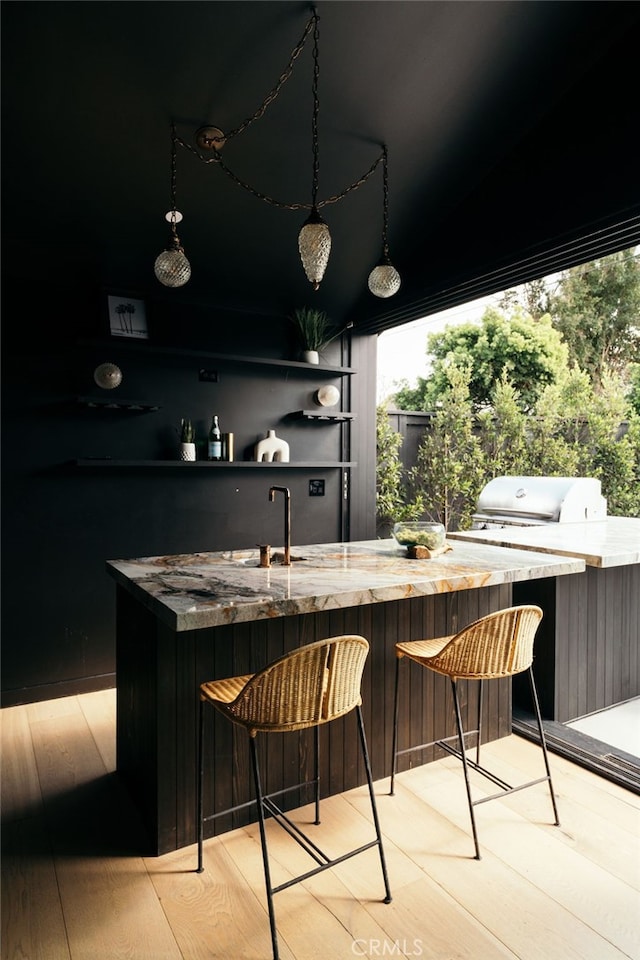 6144 W 76th St, Los Angeles, CA 90045 - bar with wet bar, light wood-style flooring, and a sink