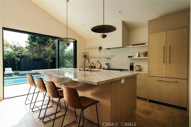 6144 W 76th St, Los Angeles, CA 90045 - kitchen featuring a kitchen breakfast bar, a sink, open shelves, high vaulted ceiling, and an island with sink