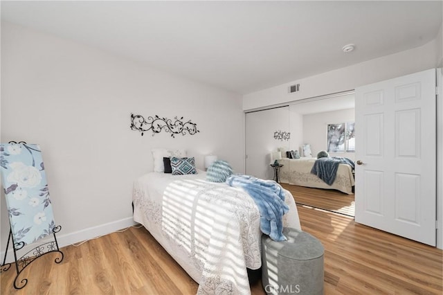 43 La Sordina, Rancho Santa Margarita, CA 92688 - bedroom featuring light wood-style flooring, a closet, and baseboards