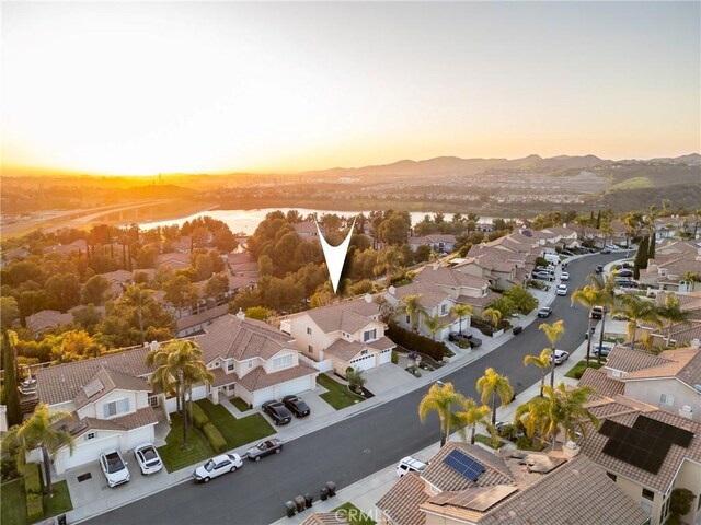 43 La Sordina, Rancho Santa Margarita, CA 92688 - aerial view at dusk of a residential view and a mountain view