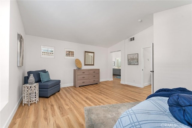 43 La Sordina, Rancho Santa Margarita, CA 92688 - bedroom with light wood-style flooring, baseboards, and vaulted ceiling