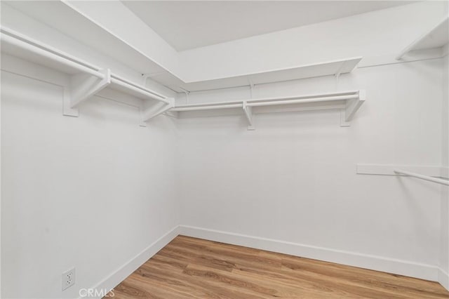 43 La Sordina, Rancho Santa Margarita, CA 92688 - spacious closet featuring wood finished floors