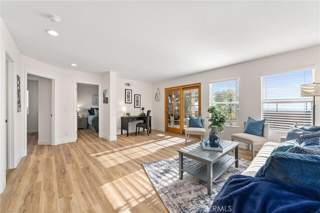 43 La Sordina, Rancho Santa Margarita, CA 92688 - living room with light wood finished floors, baseboards, an office area, and recessed lighting