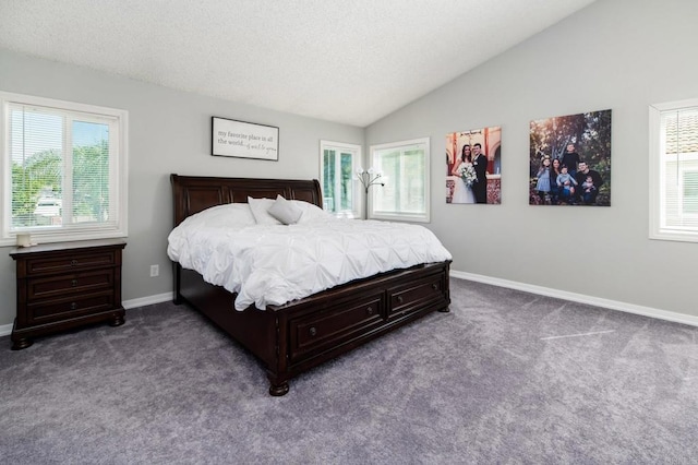 bedroom featuring baseboards, multiple windows, carpet, and lofted ceiling